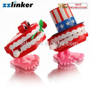 LK-S13 Dental Decoration Wind Up Toy Jump Teeth with Rose